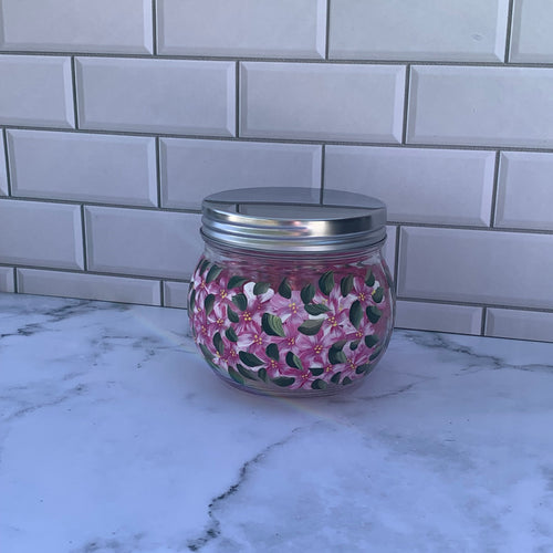 18 oz round glass jar with metal screw on lid, hand painted all around with pink floral design.