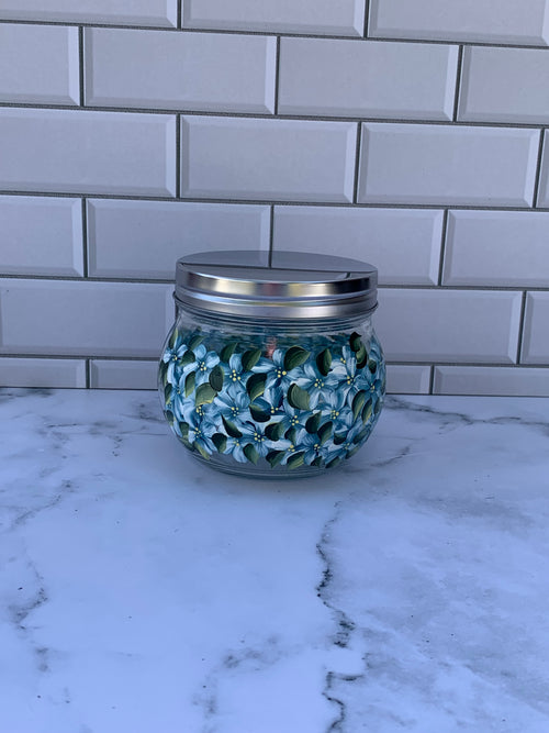 18 oz round glass jar with screw on metal lid hand painted with blue hydrangeas on all sides