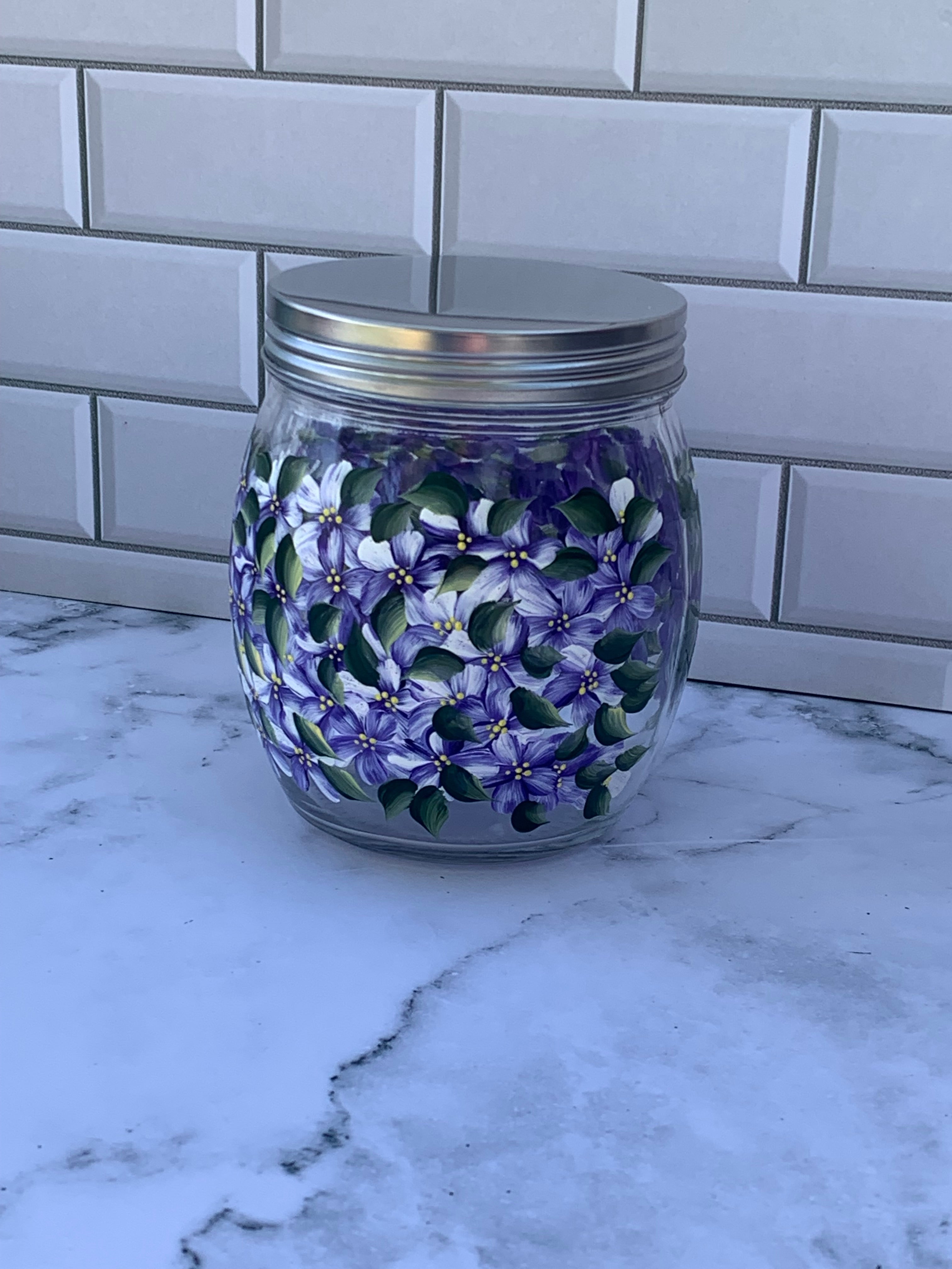 27 oz round glass storage jar with metal screw on lid hand painted with purple hydrangeas all around